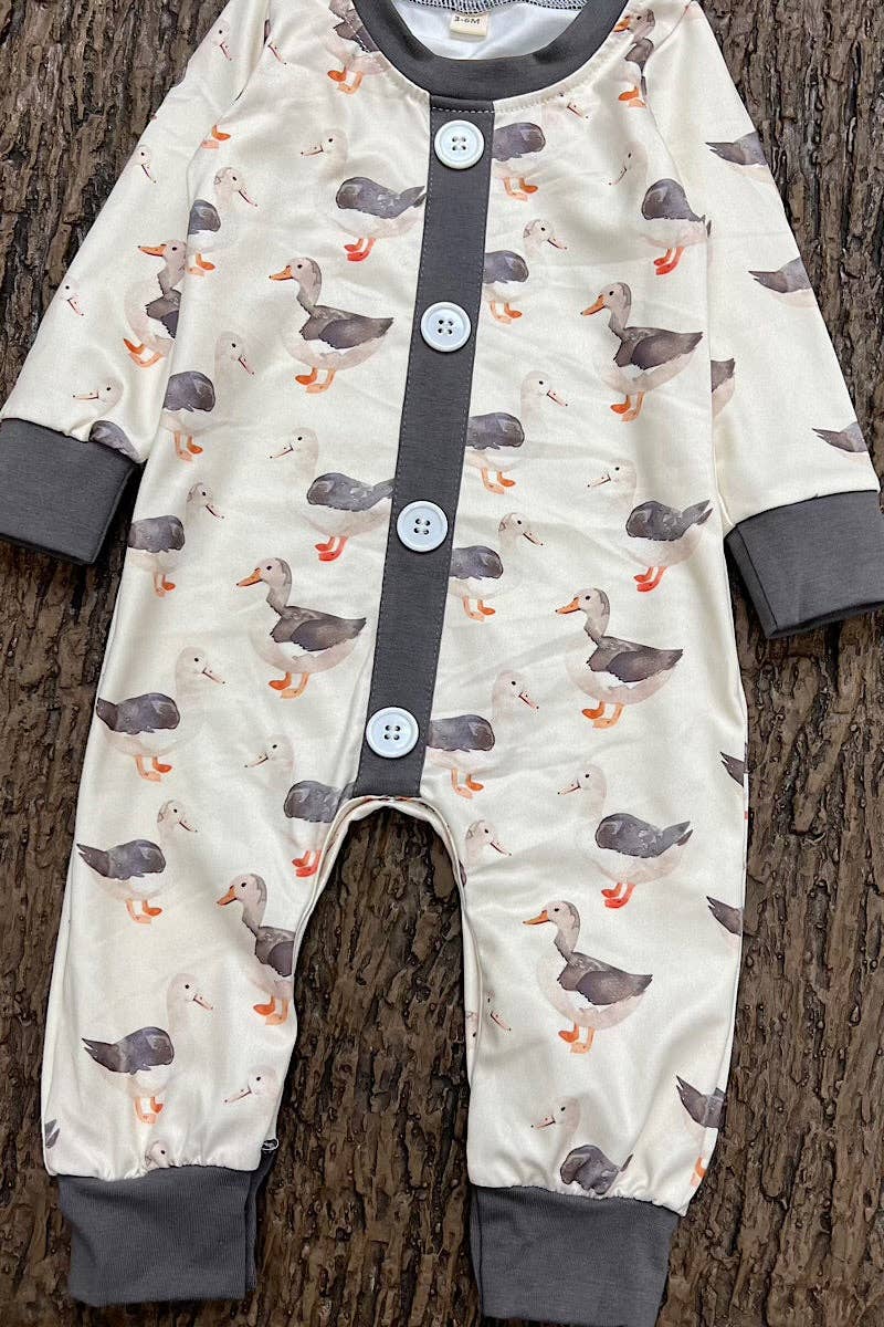 Gray Duck printed baby romper with snaps.